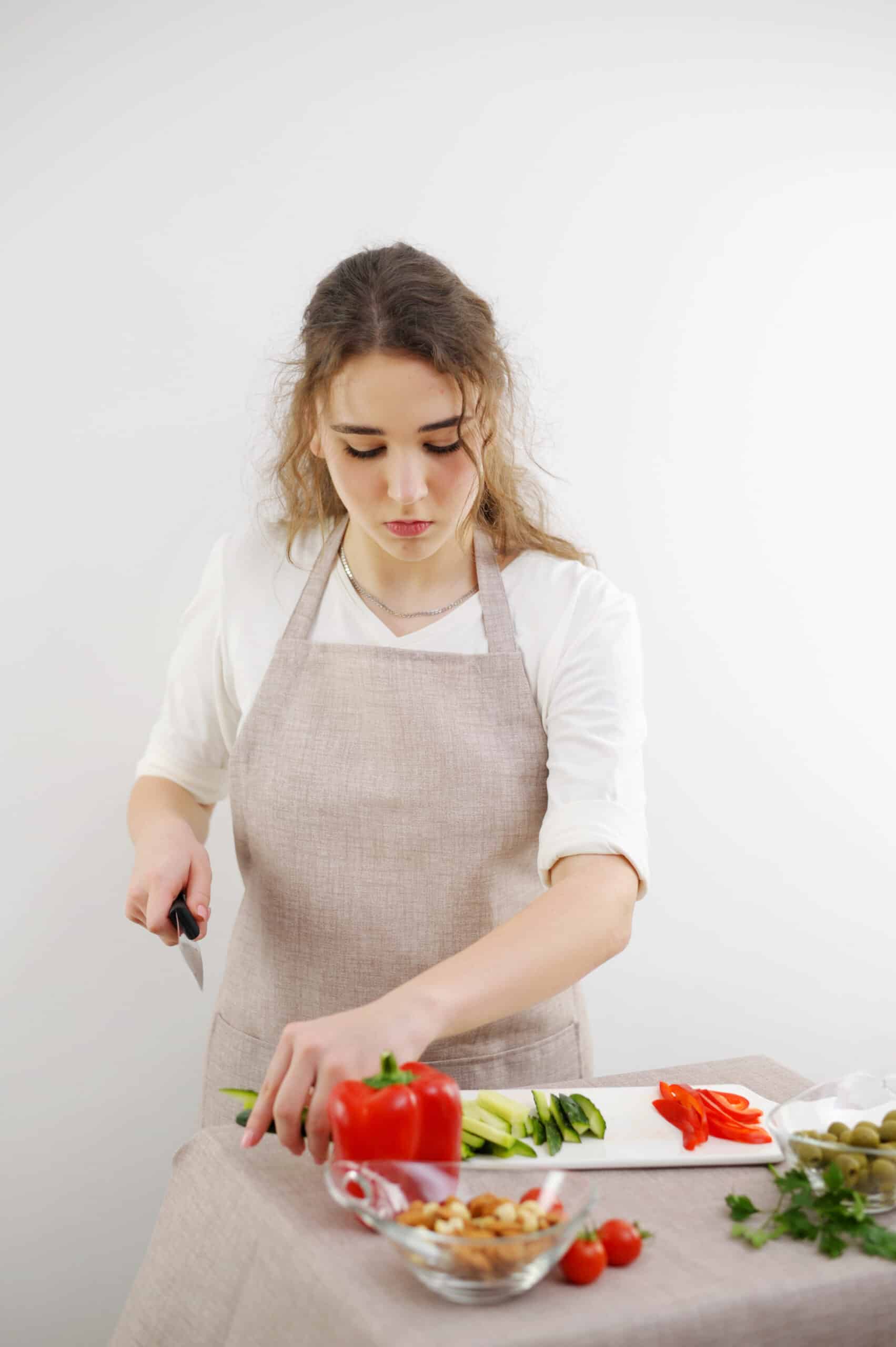 vecteezy photo portrait woman in apron watching recipe on laptop 45977767 scaled